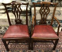 A composite set of ten 19th Century Provincial Chippendale style dining chairs with pierced