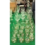 A set of five Stuart Crystal hock glasses, four Stuart Crystal champagne flutes,