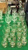 A set of five Stuart Crystal hock glasses, four Stuart Crystal champagne flutes,