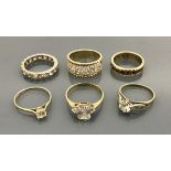 A collection of six 9 carat gold stone set dress rings,