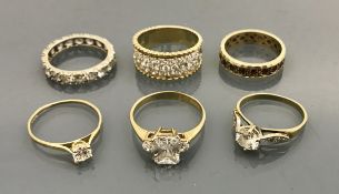 A collection of six 9 carat gold stone set dress rings,