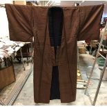 A circa 1960 men's (with cotton stuffing / interlining) winter home kimono with Muji decoration on