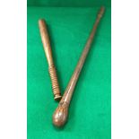 An African root wood and shaft tribal club together with an oak truncheon inscribed "H.C.C.