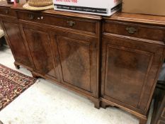 A modern burr walnut veneered breakfront side cabinet in the George III taste,