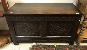 A 17th Century style oak two panel coffer