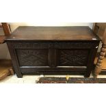 A 17th Century style oak two panel coffer