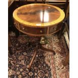 A mahogany miniature drum table in the Regency style together with a caned settee in the Louis XV