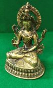 A Sino-Tibetan bronze figure seated in lotus position,