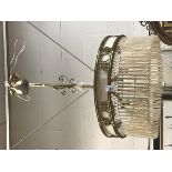 A 20th Century Art Deco design brass ceiling lantern with pierced decoration and tasseled edge