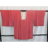 A circa 1960 silk haori (jacket) and obi with Chirimen decoration on a pink ground