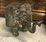 A 19th Century Indian painted wooden elephant figure of sectional construction