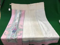 A pair of early 20th Century Chinese ivory ground and pink banded skirts with pleated and floral