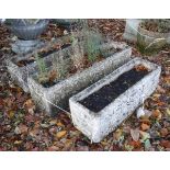 A pair of rectangular reconstituted stone troughs and a smaller similar (3)