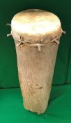 An African treen ware log type tom tom drum with hide cover