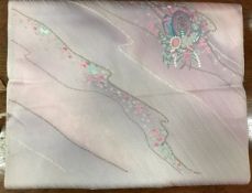 A roll of silk Chirimen kimono on pink ground