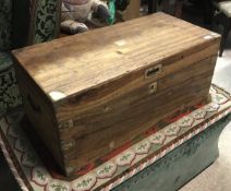 A 19th Century camphor wood trunk with brass corners and embellishments
