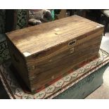 A 19th Century camphor wood trunk with brass corners and embellishments