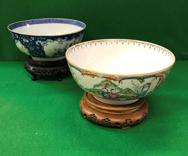 A Chinese famille-rose and blue and white decorated fruit bowl with panels of figures in garden