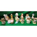 A collection of Beswick Beatrix Potter figures including lady mouse from Tailor of Gloucester,