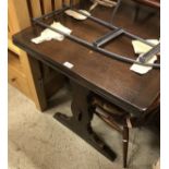 An Ercol dining table,