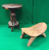 A Kenyan carved and painted wooden elephant figure and matching table with circular top together