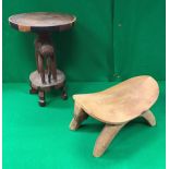 A Kenyan carved and painted wooden elephant figure and matching table with circular top together