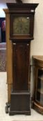 An oak long cased clock,