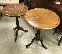 A 19th Century mahogany occasional table with starburst top on a tripod base,