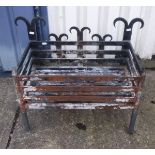 A cast iron fire basket