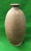 A 19th Century Japanese bizen yaki vase with turned line decoration and incised mark to the