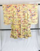 A circa 1920 Haori Yuzen kimono with Sansui Ni Hana (mountain water and flower) pattern on a yellow