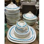 A 19th Century Minton style ribbon and gilt decorated part dinner service including tureens,