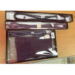 A purple silk obi age and obi shime set (cased),