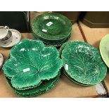 A collection of Wedgwood and other green leaf pottery plates (18)