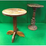 Two African carved hardwood pedestal occasional tables
