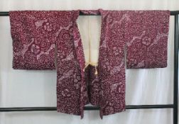 A circa 1960 silk haori (jacket) with So-Shibori (tie-dyed) decoration on a plum ground