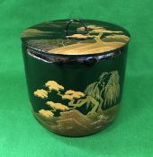 A modern Japanese wajiman nuri black and gold lacquer mizusashi (lidded bowl) with matsu tree