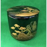 A modern Japanese wajiman nuri black and gold lacquer mizusashi (lidded bowl) with matsu tree