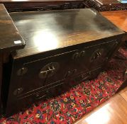 A modern Chinese stained hardwood cabinet with two pairs of cupboard doors over two drawers on