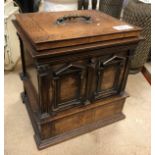 A 19th Century mahogany and inlaid box, the rising lid opening to reveal three sections,