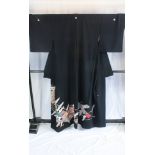 A circa 1980 Tomesode silk kimono with Noshime ni Tsuru (Ribbon & crane) design on a black ground