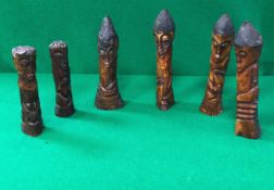 A collection of six African carved bone fetish or fertility figures probably Lega Congo