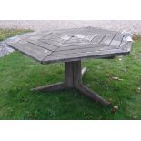 A hexagonal wooden garden table