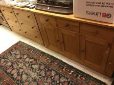 A light oak sideboard,