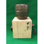 A modern un-used Japanese waji manuri natsume (lidded pot) with matsukasa decoration,