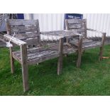 A teak twin garden chair and table set