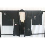 A circa 1940 silk haori (jacket) with Shibori (tie-dyed) decoration on a black ground