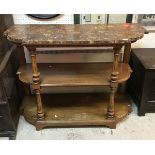 A Victorian oak buffet of three tiers,