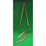A collection of Aboriginal artefacts to include a late 19th/early 20th Century carved boomerang