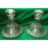 A pair of Victorian pineapple cut ship's decanters with scrollwork decorated banding and cut